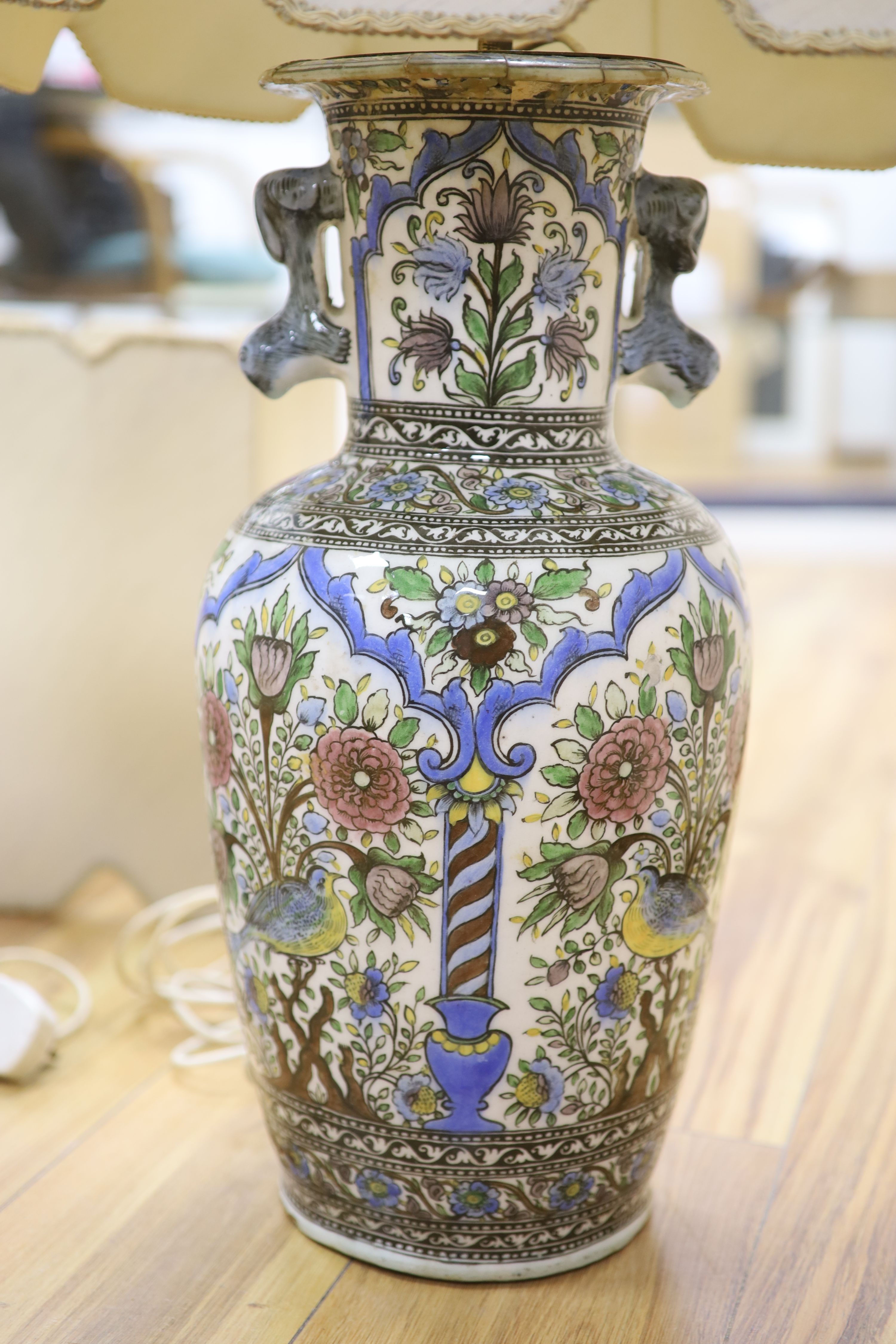 A pair of modern Persian-style pottery vases, fitted as table lamps, height 50cm